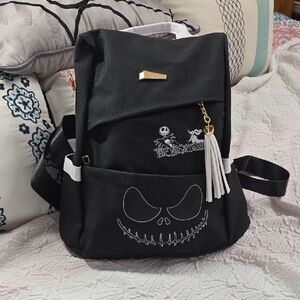 Black Backpack with Embroidered Design